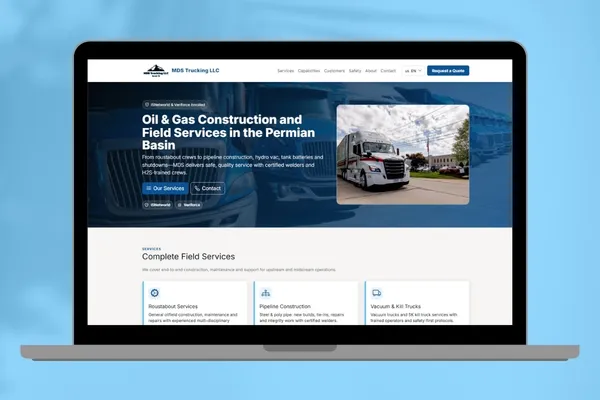 Sitio web de MDS Trucking LLC que ofrece servicios de construcción y campo para la industria de petróleo y gas en la cuenca Pérmica (Permian Basin). La imagen muestra un camión de carga blanco en primer plano, una flota de transporte al fondo y menciones a certificaciones de seguridad como ISNetworld y Veriforce.